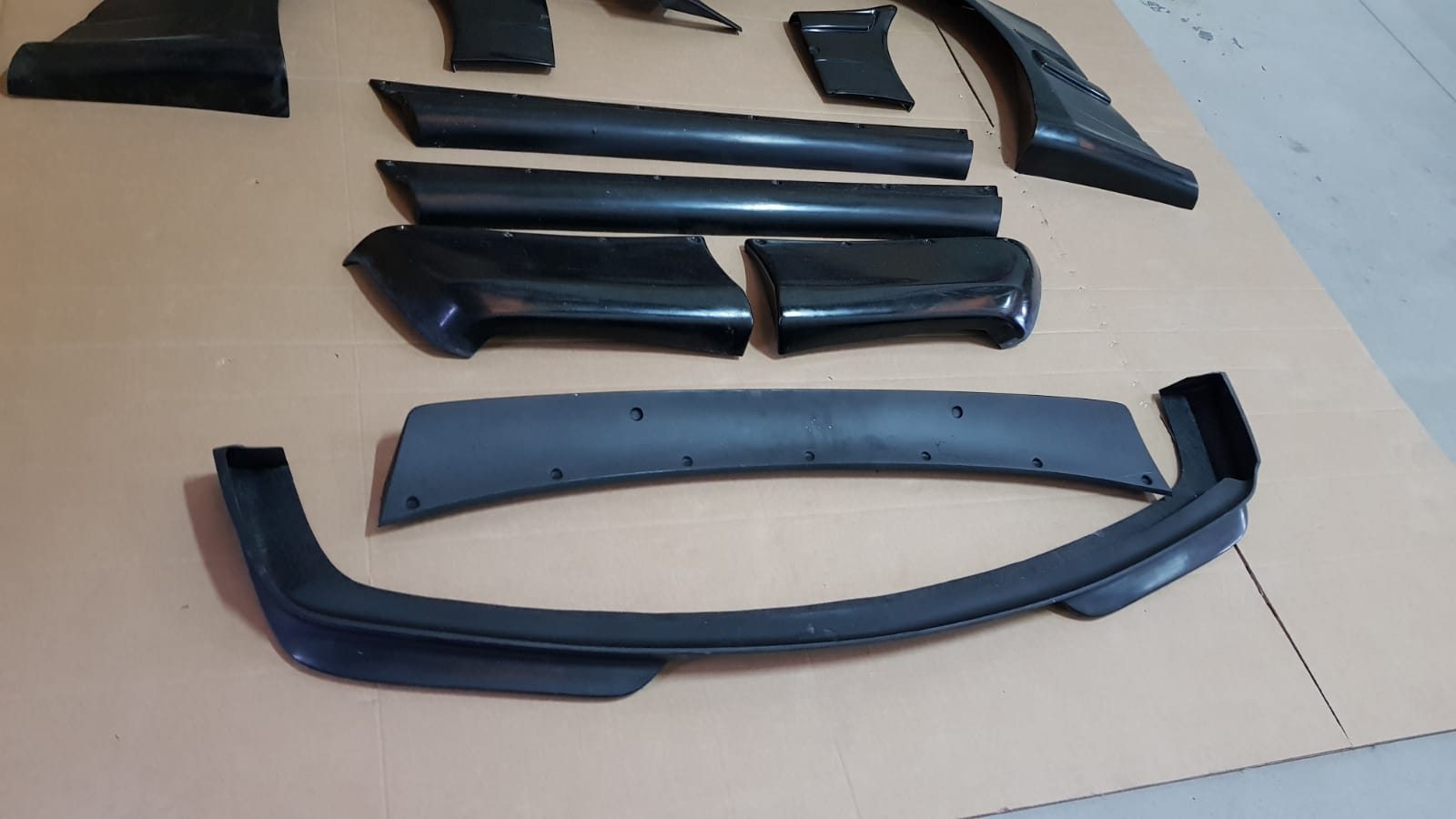 Rocket Bunny style front lip and widebody elements for BMW E36 Coupe.