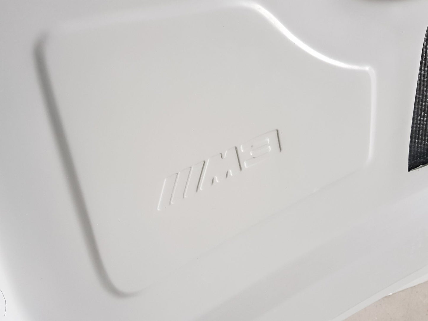 Side Close-up of Bonnet for BMW E90 LCI M3 Look. Made from 1st grade FRP (reinforced fiberglass)