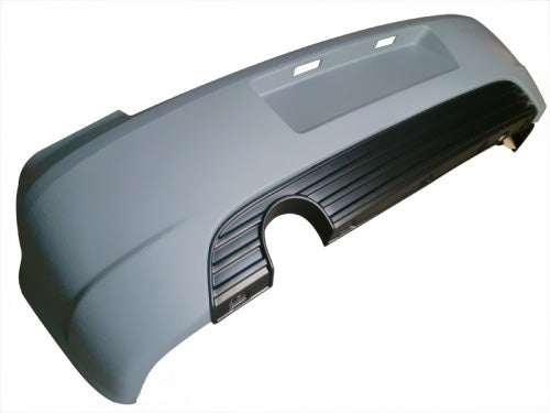 Rear bumper Volkswagen Golf IV R-Line II in primer finish, featuring black lower diffuser and exhaust cutout, ready for installation.