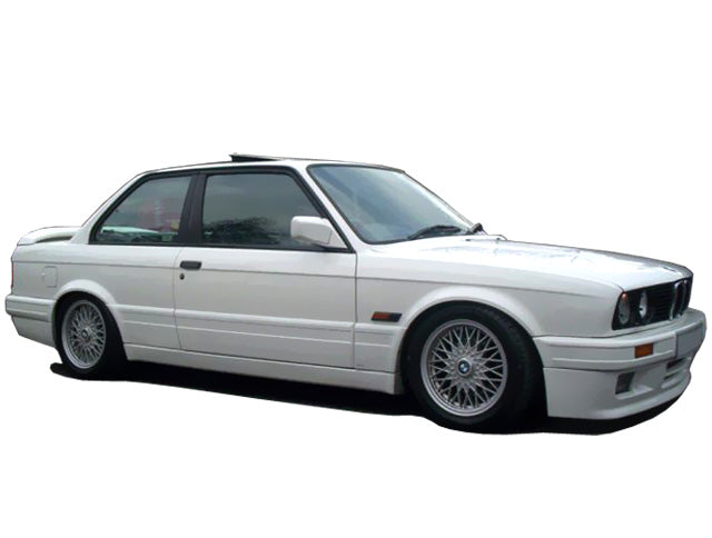 White BMW 3 Series E30 2-door with M-Tech side skirts and door panels.