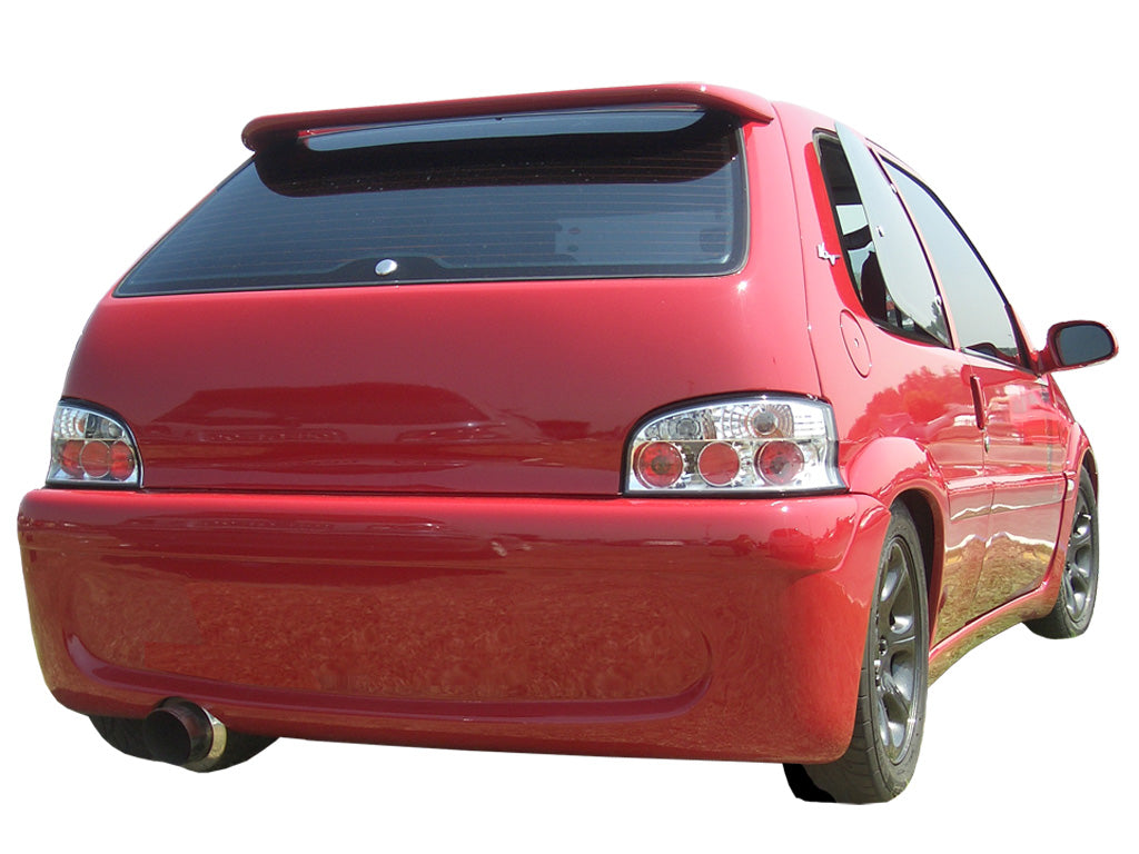 Red Citroën Saxo with Cup rear bumper, featuring a smooth racing design with integrated exhaust cutout and clean aerodynamic lines.