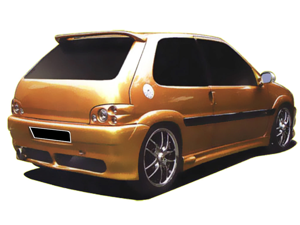Gold Citroën Saxo with Demon rear bumper, designed with dual cutouts and a smooth aerodynamic finish for a sporty customized appearance.