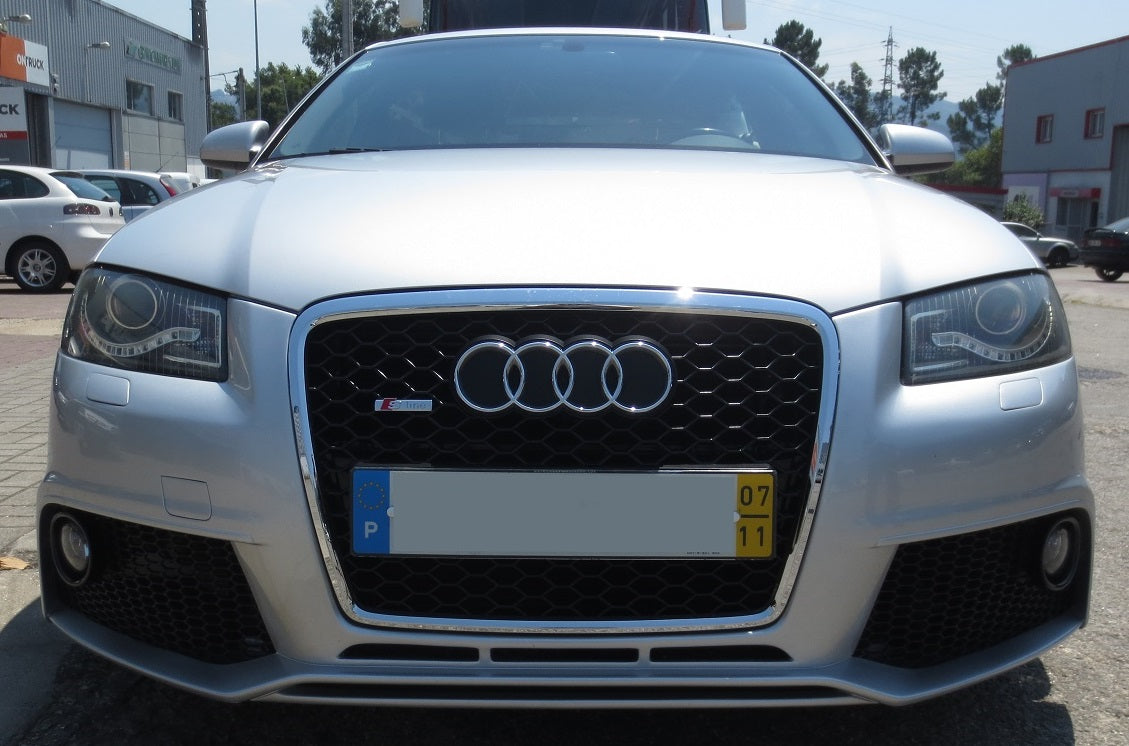 Silver Audi A3 8P with RS3 Look front bumper and fog lights, featuring a honeycomb grille and aggressive sporty design.