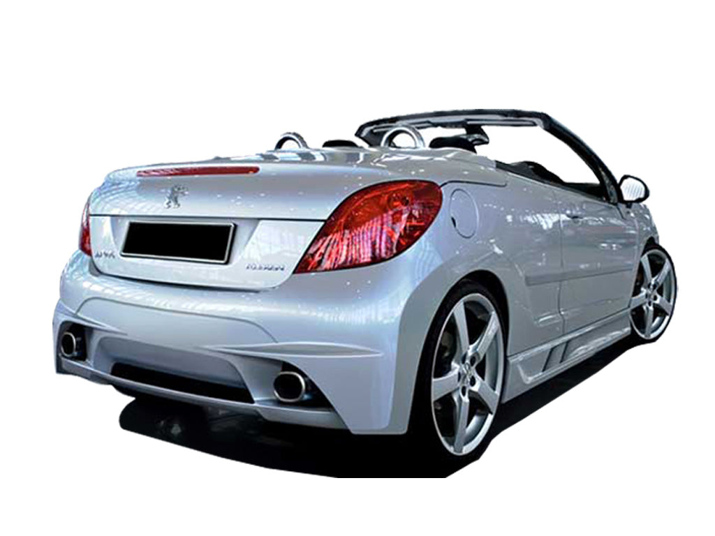 Silver Peugeot 207 CC convertible with Super Star rear bumper installed, viewed from the rear-left angle, showing the dual exhaust outlets and five-spoke alloy wheels.