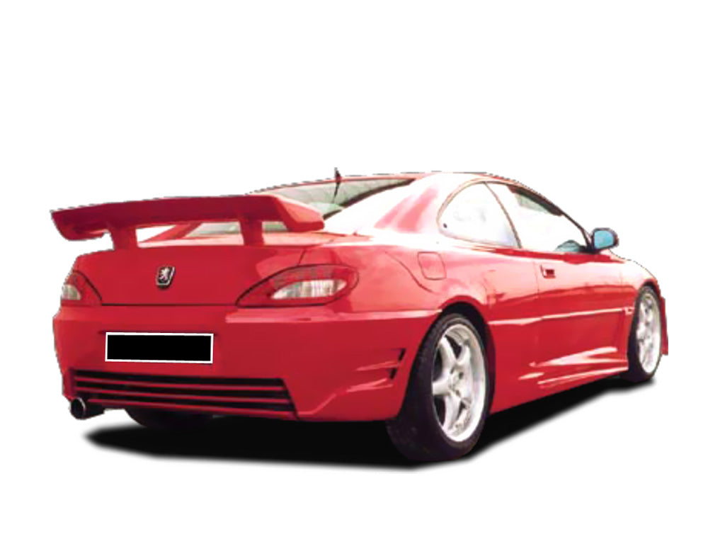 Red Peugeot 406 with Domus rear bumper installed, viewed from the rear-right angle, showing the large spoiler, aerodynamic lines, and single exhaust outlet.