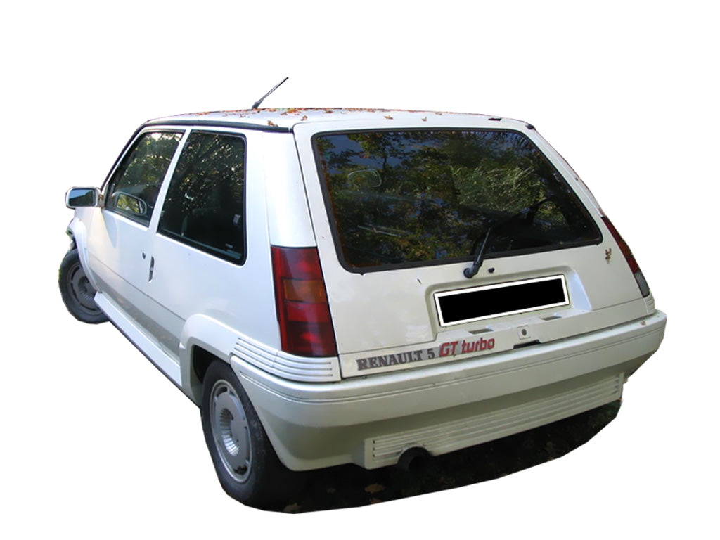 Rear bumper for Renault Super 5 GT Turbo on a white Renault 5, featuring the model’s signature ribbed lower valance, single exhaust outlet, and classic GT Turbo styling.
