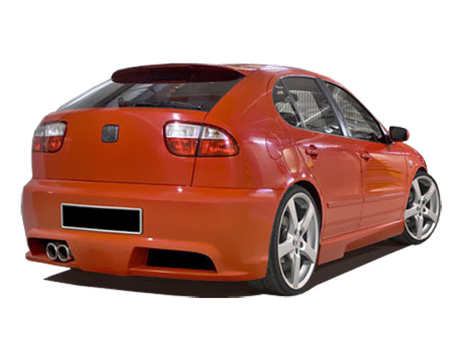 Rear bumper fitted on an orange Seat Leon, featuring a lowered sporty design, dual exhaust exit, and wide aerodynamic rear profile.