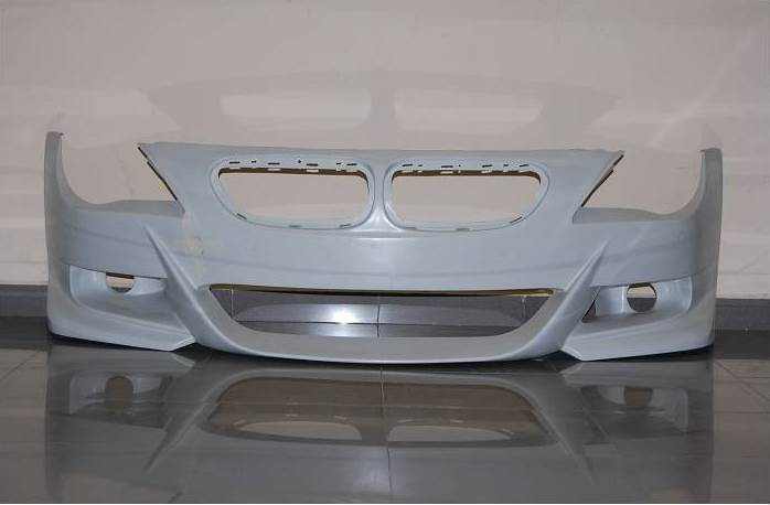 BMW 6 Series E63 M6 Look front bumper in primer finish, featuring wide central grille opening, integrated side vents and round fog light cutouts.