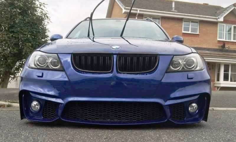 Front View of Front Bumper for BMW 3 Series E90/E91 PRE-LCI M4 Look Fog Lights on vehicle. Made from 1st grade FRP (reinforced fiberglass)