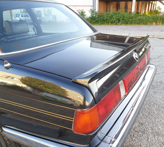 TRUNK SPOILER BMW E21 ALPINA fitted on a black BMW E21, shown from the upper rear three-quarter view