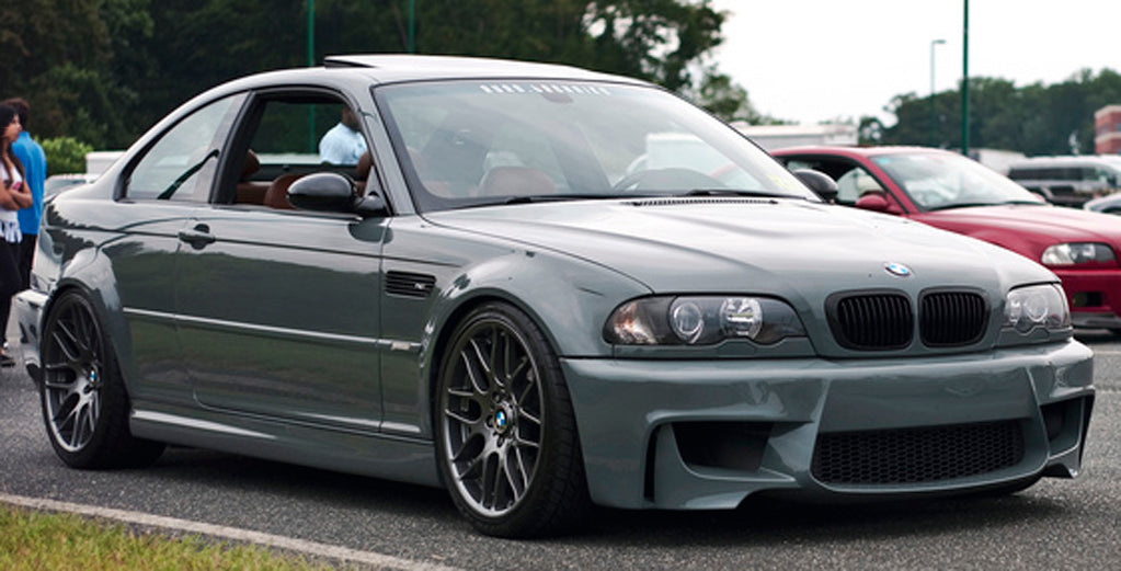 Side Close-up of Front Bumper for BMW 3 Seires E46 1M Look on vehicle. Made from 1st grade FRP (reinforced fiberglass)