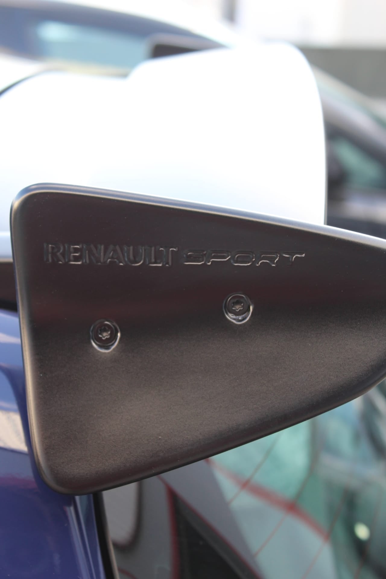 Close-up of Roof Spoiler for Renault Clio III Sport on vehicle. Made from 1st grade FRP (reinforced fiberglass)