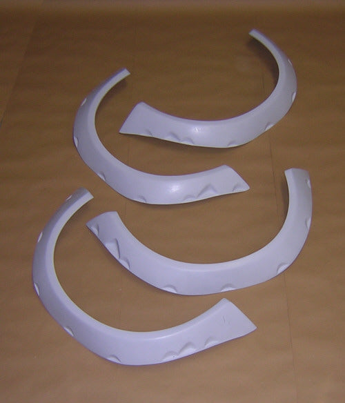 Set of Wheel Arches for Ford Fiesta. Made from 1st grade FRP (reinforced fiberglass) 