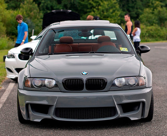 Front View of Front Bumper for BMW 3 Seires E46 1M Look on vehicle. Made from 1st grade FRP (reinforced fiberglass)
