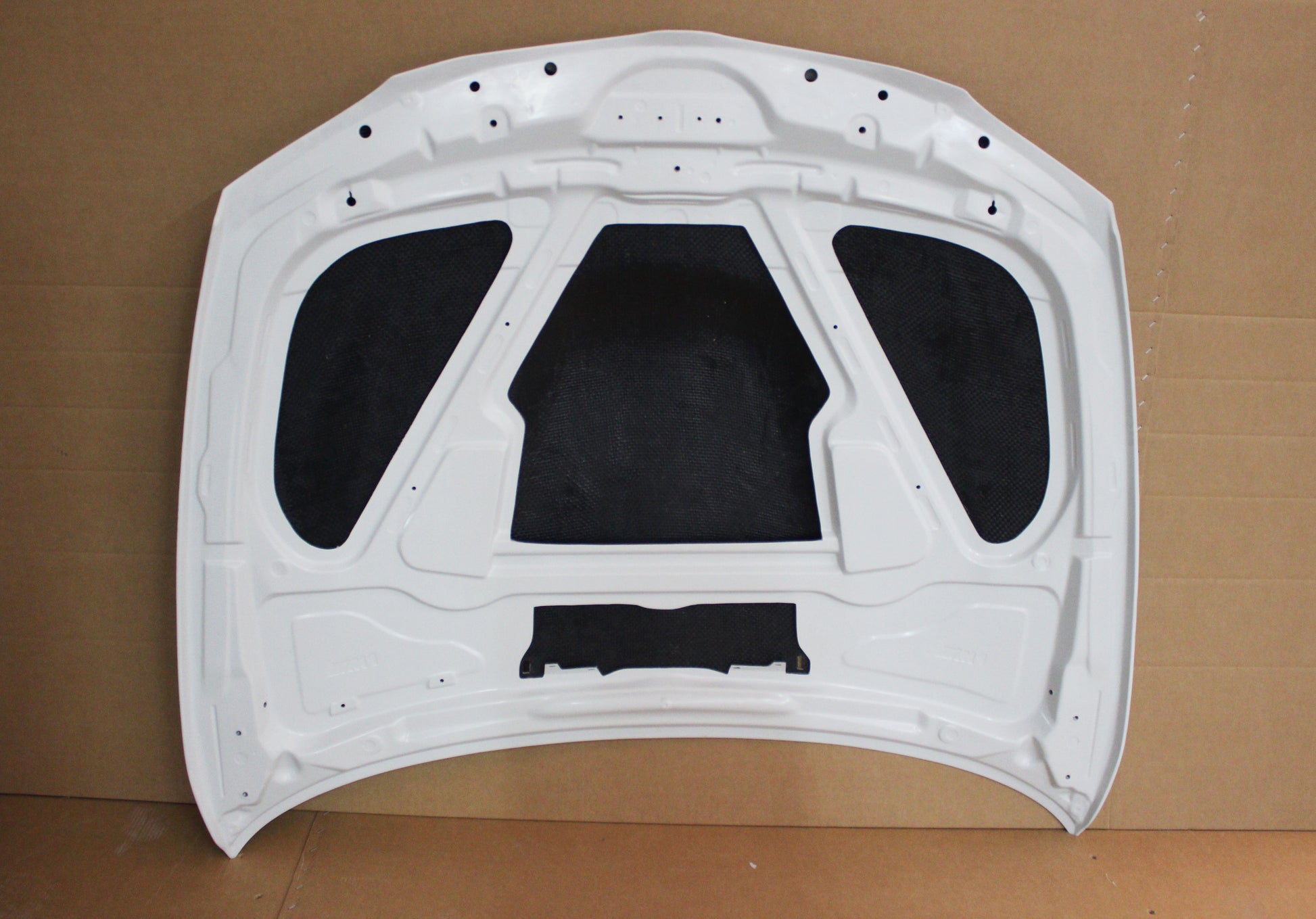 Full underside view of bonnet BMW 1 Series E81/E82/E87/E88 M1, featuring reinforced panel structure and insulation areas.