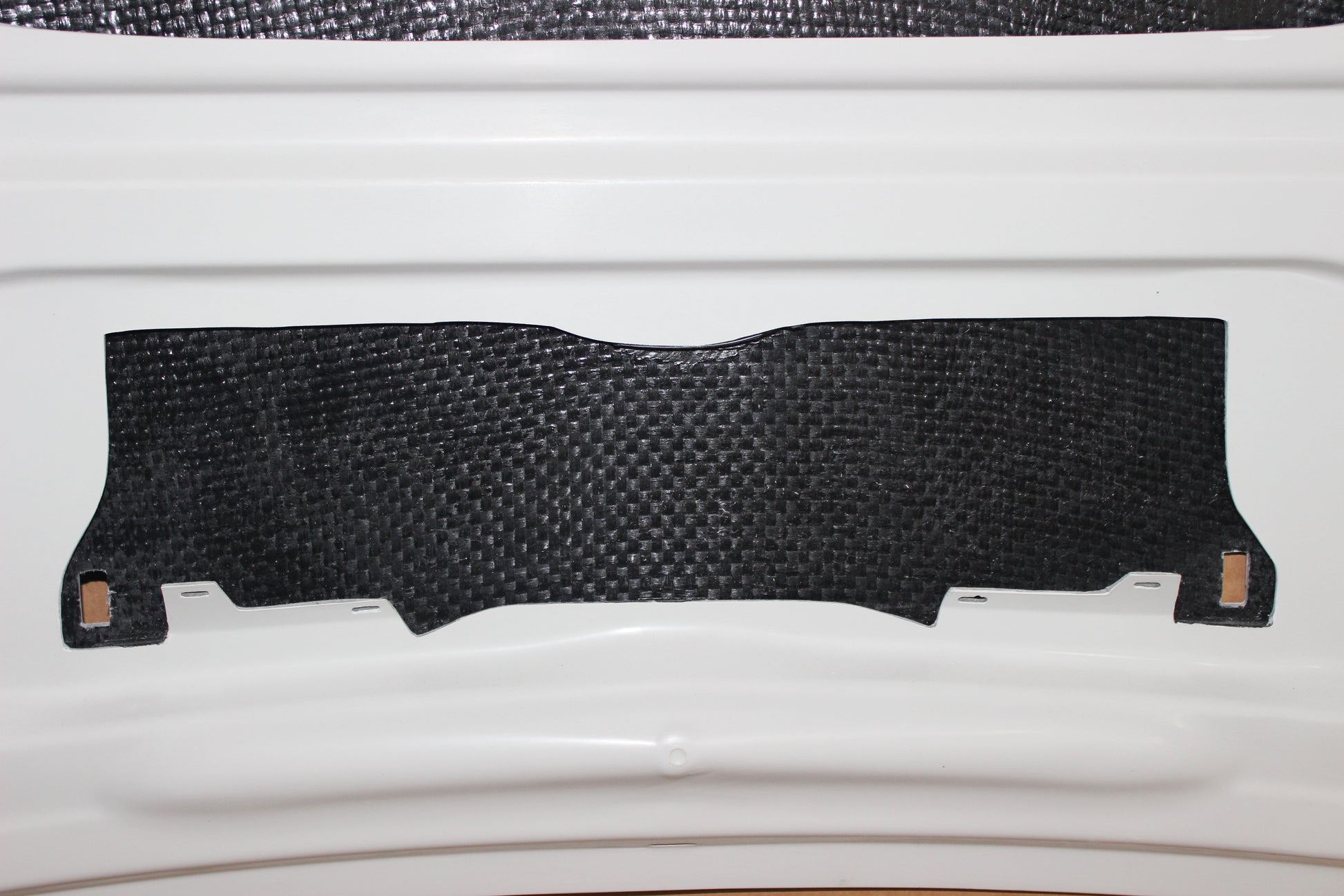 Detail of heat shield insulation on the inside of bonnet BMW 1 Series E81/E82/E87/E88 M1.