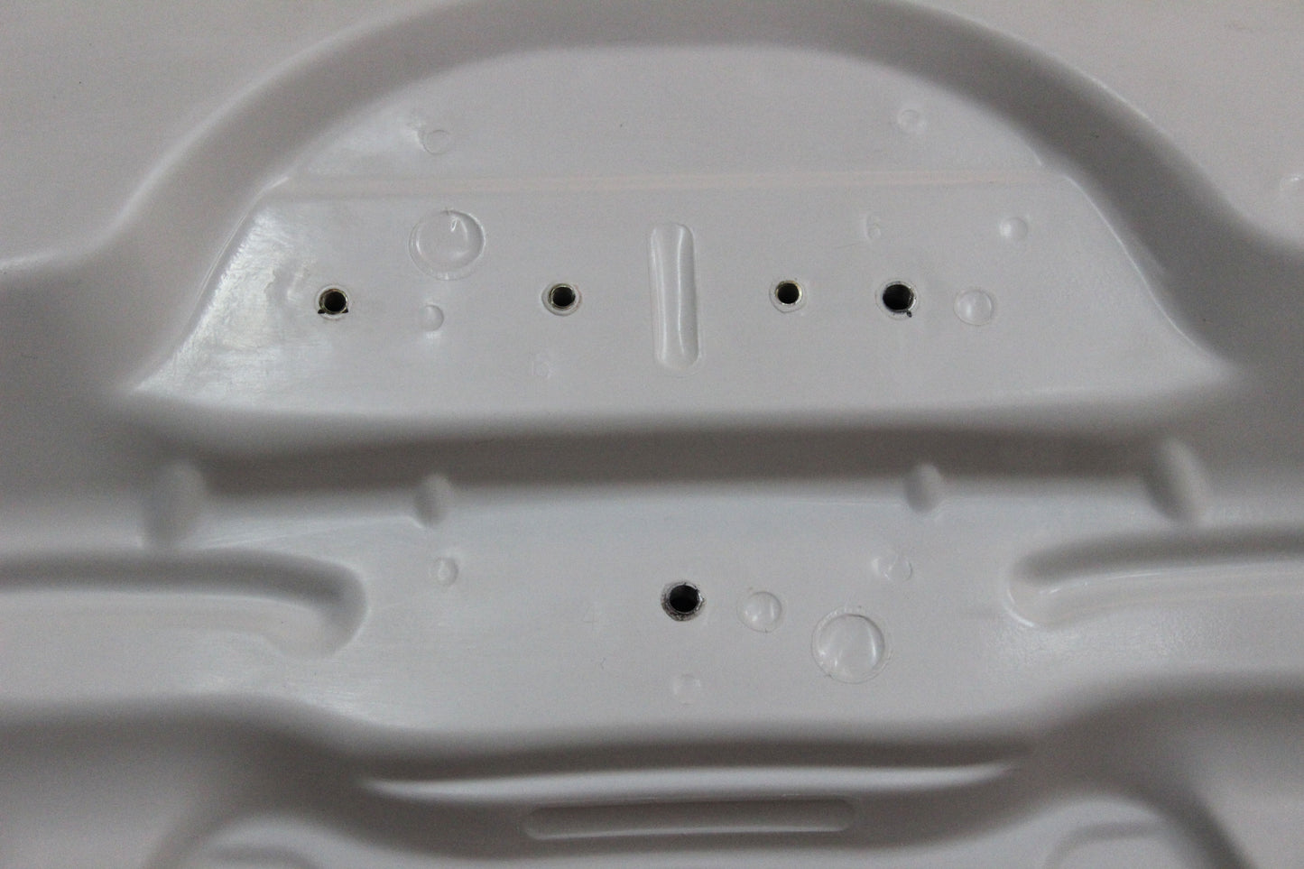Detail view of bonnet BMW 1 Series E81/E82/E87/E88 M1 showing inner mounting points and structural reinforcements.