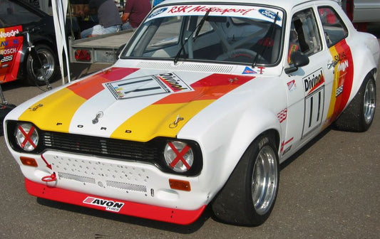 Modified Ford Escort MK1 race car featuring a widebody kit, lowered suspension, and a front lip Ford Escort MK1 installed.