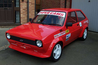 Front View of Set of Wheel Arches for Ford Fiesta on vehicle. Made from 1st grade FRP (reinforced fiberglass)