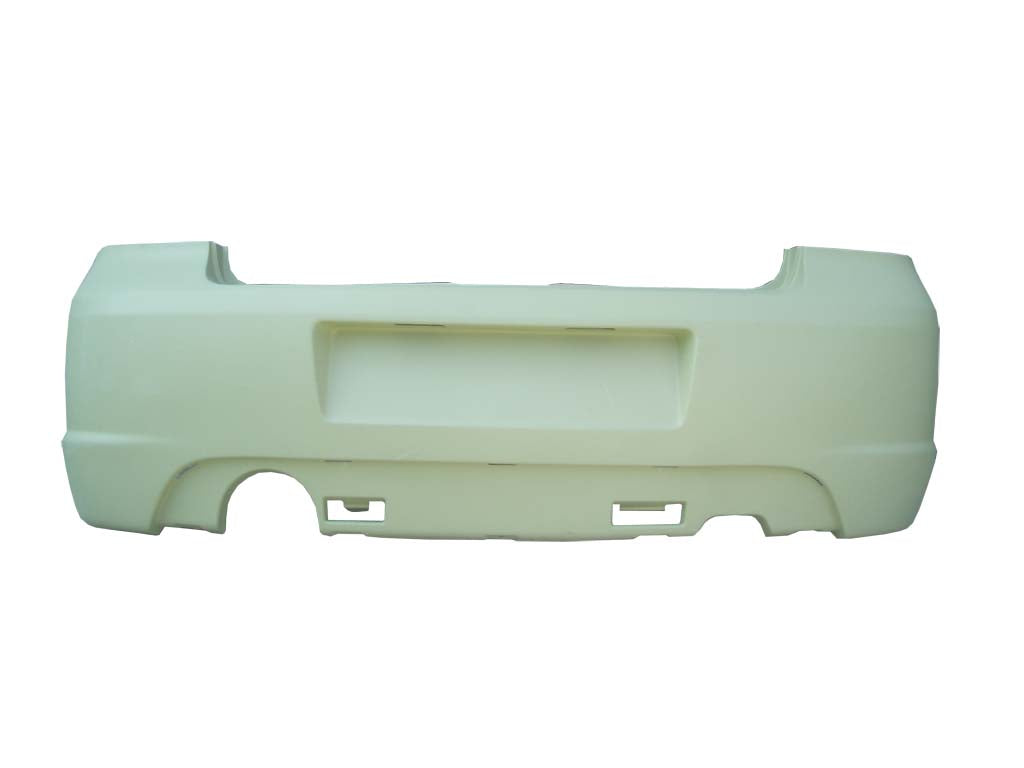 Unpainted fiberglass rear bumper panel for Volkswagen Golf IV R-Line I, bottom view with cutouts.