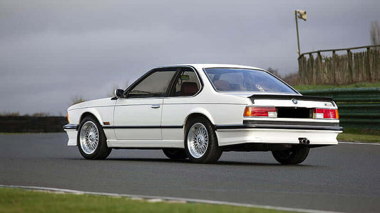 TRUNK SPOILER BMW E24 ALPINA fitted on a white BMW E24, shown from the rear three-quarter view