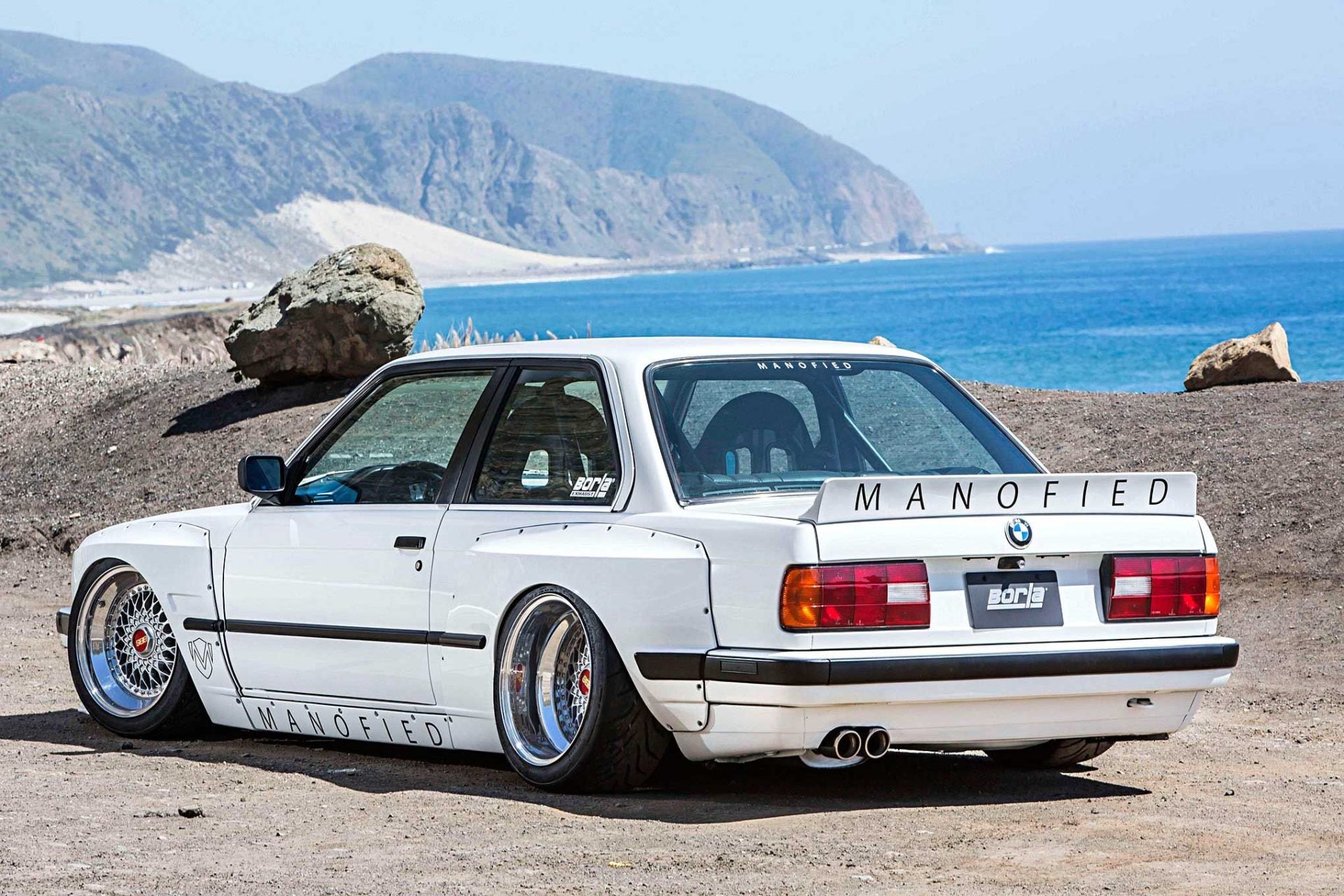Side View of Body Kit BMW E30 Coupe "Rocket Bunny" on vehicle