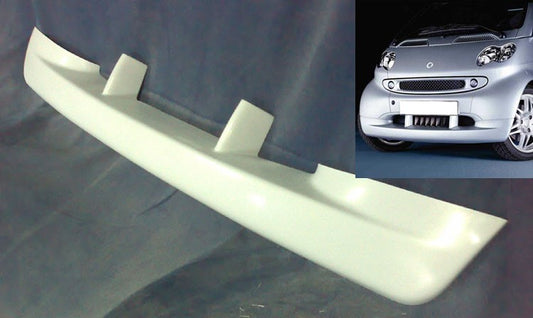 Smart ForTwo front lip for 1st generation phase 2 model, shown unpainted with example installation on the bumper.