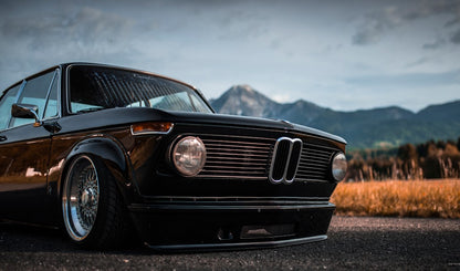 Front View of Front Lip for BMW 2002 Turbo on vehicle. Made from 1st grade FRP (reinforced fiberglass)