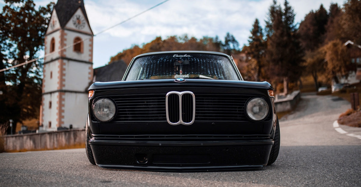 Front View of Front Lip for BMW 2002 Turbo on vehicle. Made from 1st grade FRP (reinforced fiberglass)