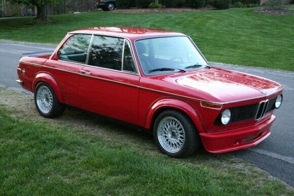 Side View of Set of Wheel Arches for BMW 2002 Turbo on vehicle. Made from 1st grade FRP (reinforced fiberglass)