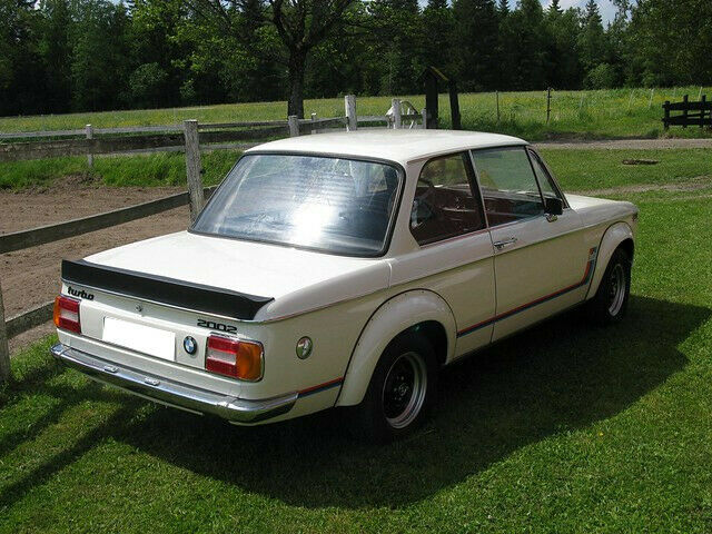 Back View of Set of Wheel Arches for BMW 2002 Turbo on vehicle. Made from 1st grade FRP (reinforced fiberglass)