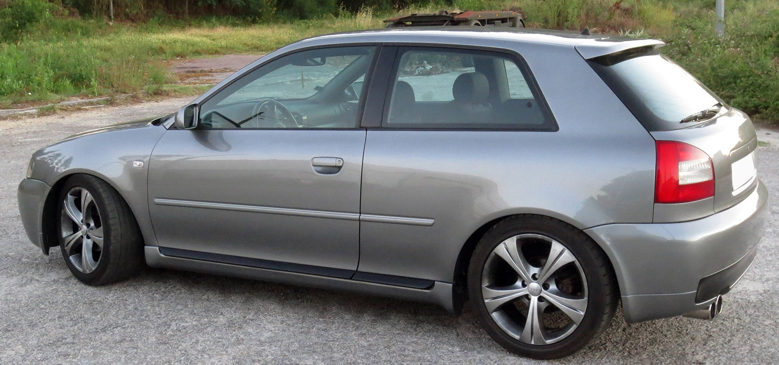 Side View of Side Skirts & Door Mouldings for Audi A3/8L S3 Look (6 PIECES) on vehicle. Made from 1st grade FRP (reinforced fiberglass)