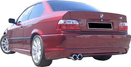 BMW 3 Series E36 Coupe with Pack M look rear bumper, featuring dual exhaust outlets, aerodynamic lines, and a sporty design for an aggressive appearance.