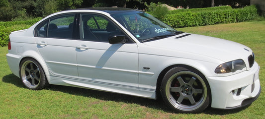 Side View of Side Skirts for BMW 3 SERIES E46 1M Look on vehicle. Made from 1st grade FRP (reinforced fiberglass)