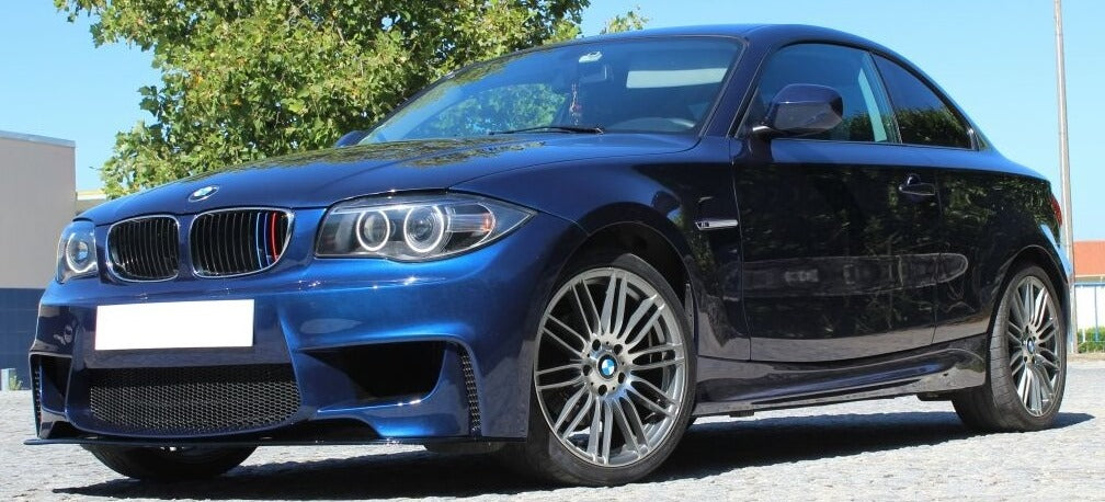 Front View of Side Skirts for BMW 1 SERIES E82/E88 1M Look on vehicle. Made from 1st grade FRP (reinforced fiberglass)