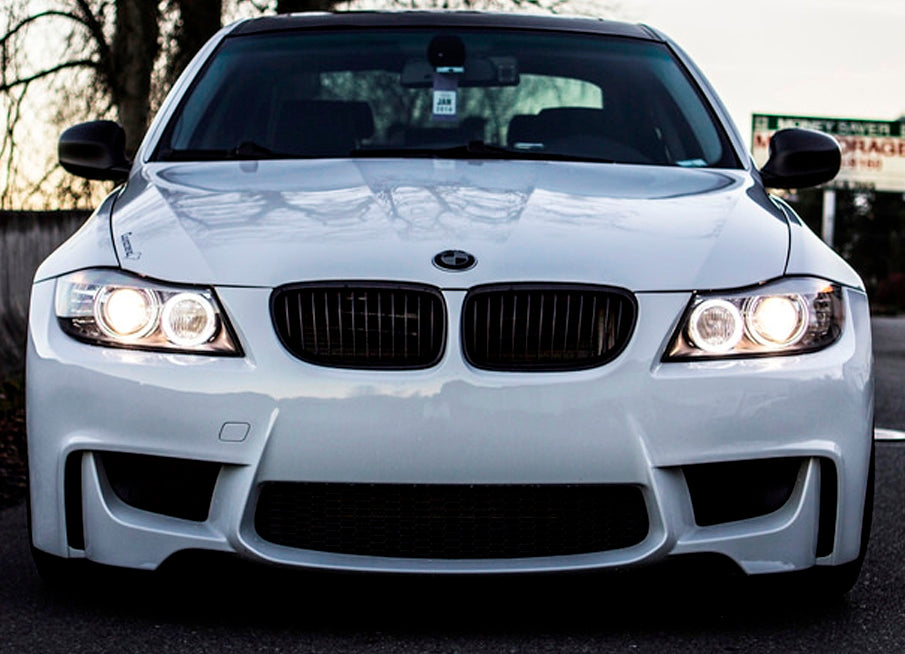 Front View of Front Bumper for BMW 3 Series E90/E91 LCI Look on vehicle. Made from 1st grade FRP (reinforced fiberglass)