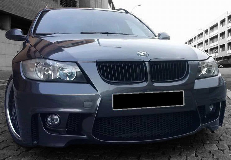 Front View of Front Bumper for BMW 3 Series E90/E91 PRE-LCI 1M Look on vehicle, Fog Lights not included. Made from 1st grade FRP (reinforced fiberglass)