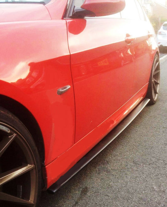 Close-up View of Set of Extension Blades for Side Skirts for BMW 3 SERIES E90/E91 PACK M on vehicle. Made from 1st grade FRP (reinforced fiberglass)