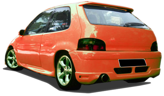 Orange Citroën Saxo with Gladiator rear bumper, designed with an integrated exhaust cutout and aerodynamic lines for a sporty modified appearance.