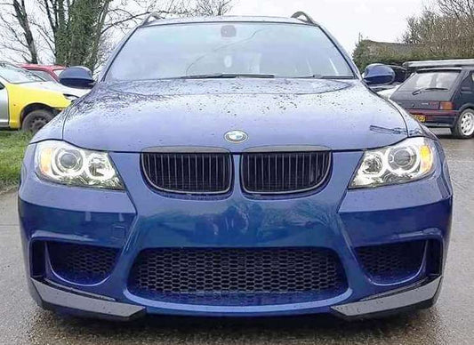Front View of Front Bumper for BMW 3 Series E90/E91 PRE-LCI FR Style on vehicle. Made from 1st grade FRP (reinforced fiberglass)