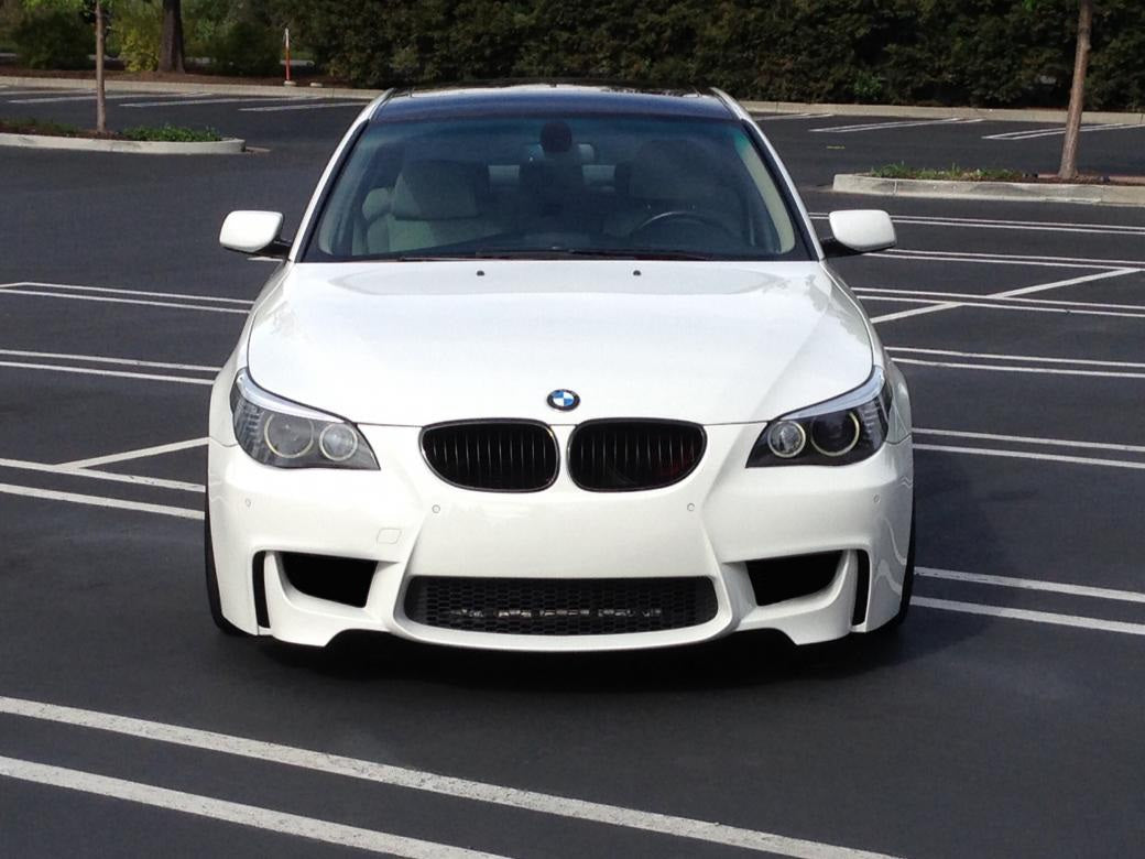 Front View of Front Bumper for BMW 5 Series E60/E61 1M Look on vehicle. Made from 1st grade FRP (reinforced fiberglass)