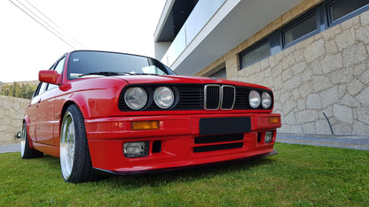 Front View of Front Bumper for BMW 3 SERIES E30 M-TECK PH1 and PH2 on vehicle (Front Lip & Fog Lights not included). Made from 1st grade FRP (reinforced fiberglass)