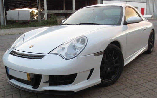 Front View of Front Bumper for Porsche 911/996 Ph2 on vehicle. Front Lip included. Made from 1st grade FRP (reinforced fiberglass)